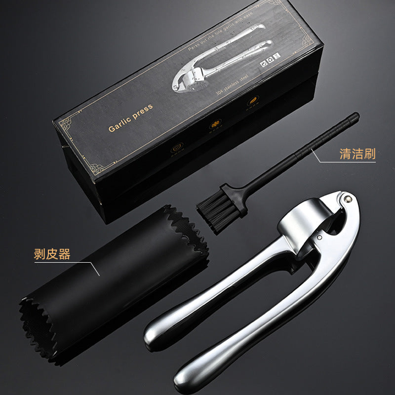 Hachoir à ail en métal avec éplucheur et brosse
