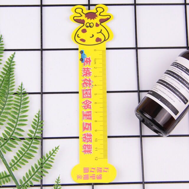 Règle en forme de tête de vache