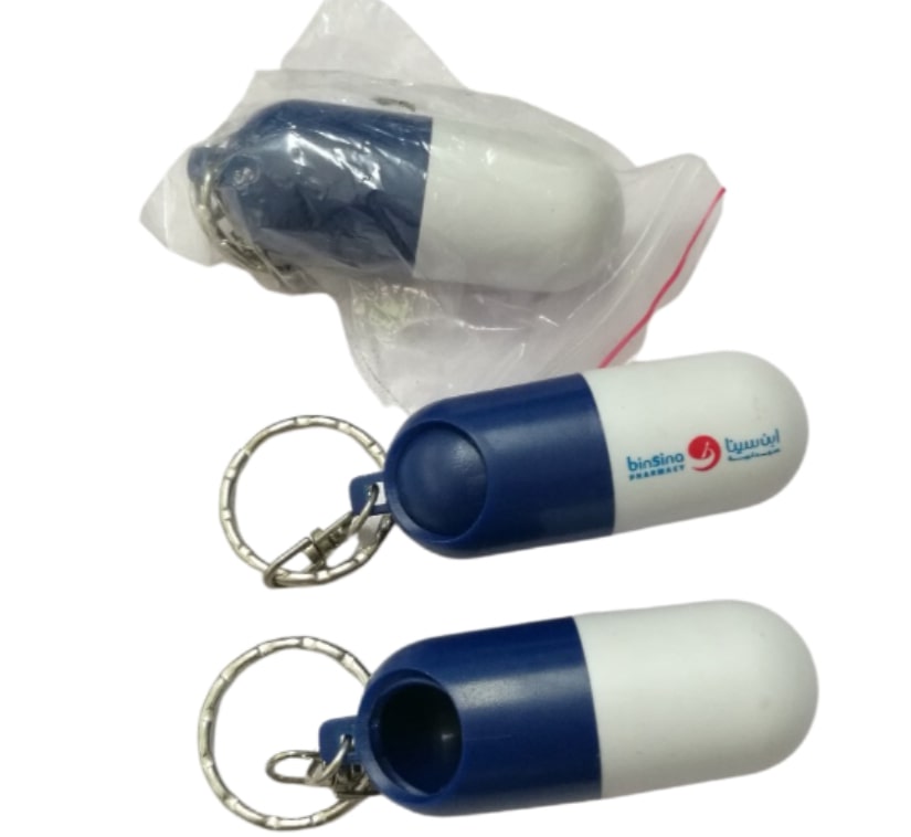 Llavero con forma de cápsula