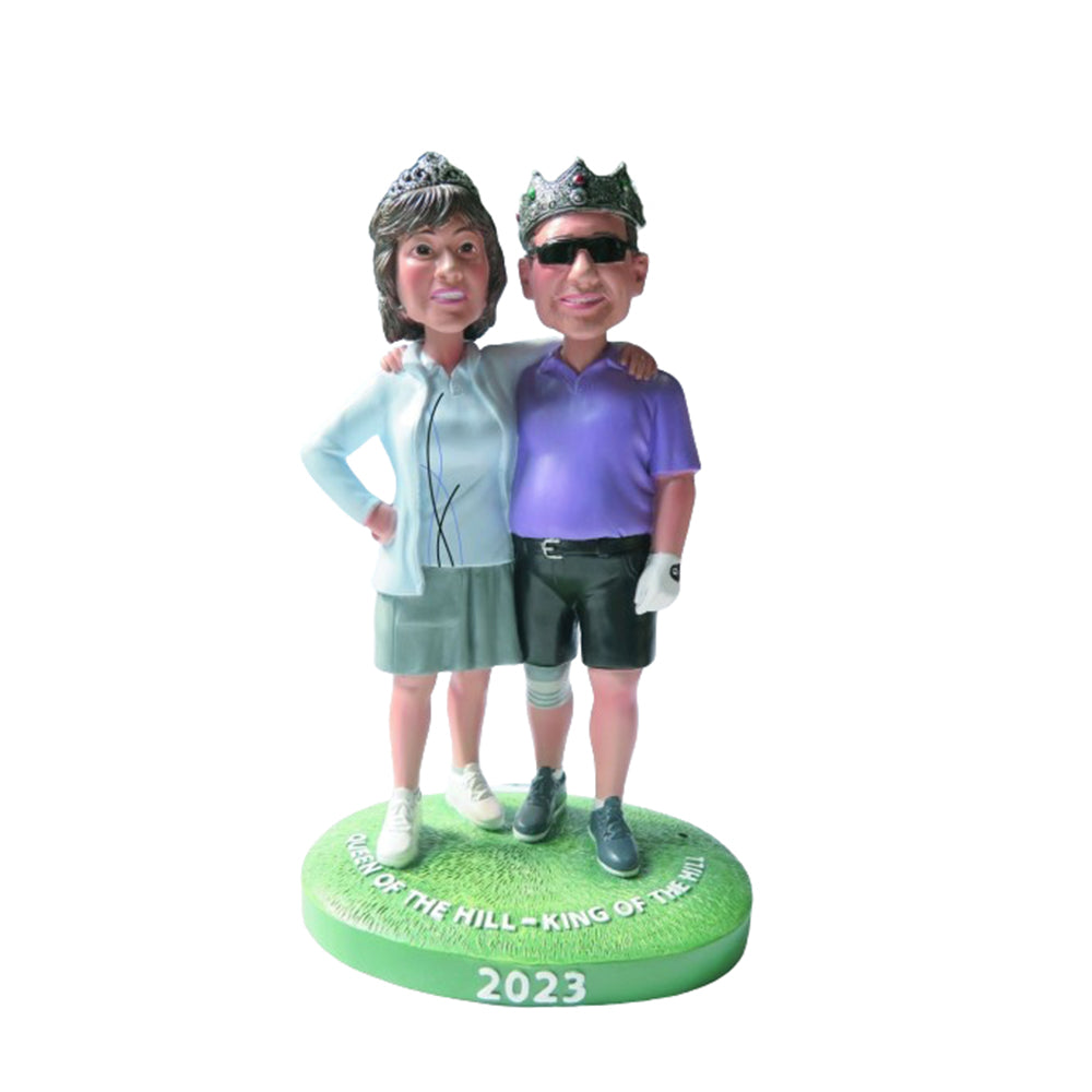 Figurine à tête branlante en résine Double People