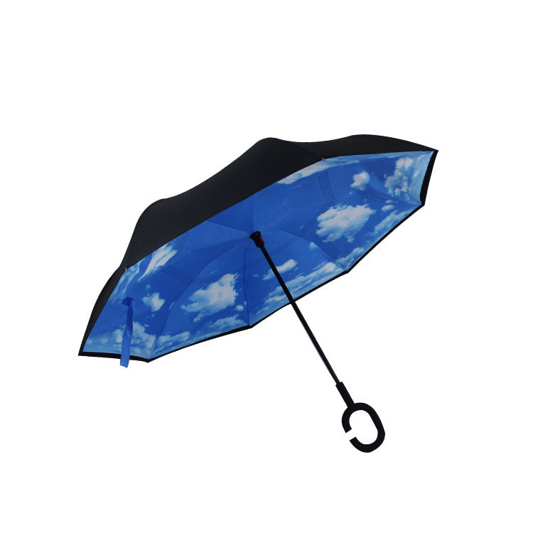 Le parapluie inversé Ciel bleu et nuages