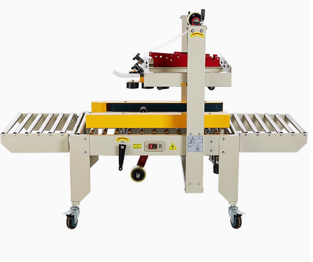 Machine à scotcher les boîtes