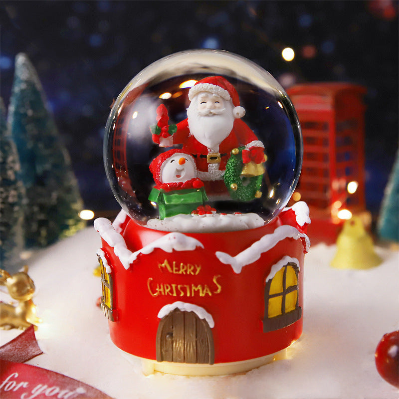 Bola de nieve navideña con luz y música