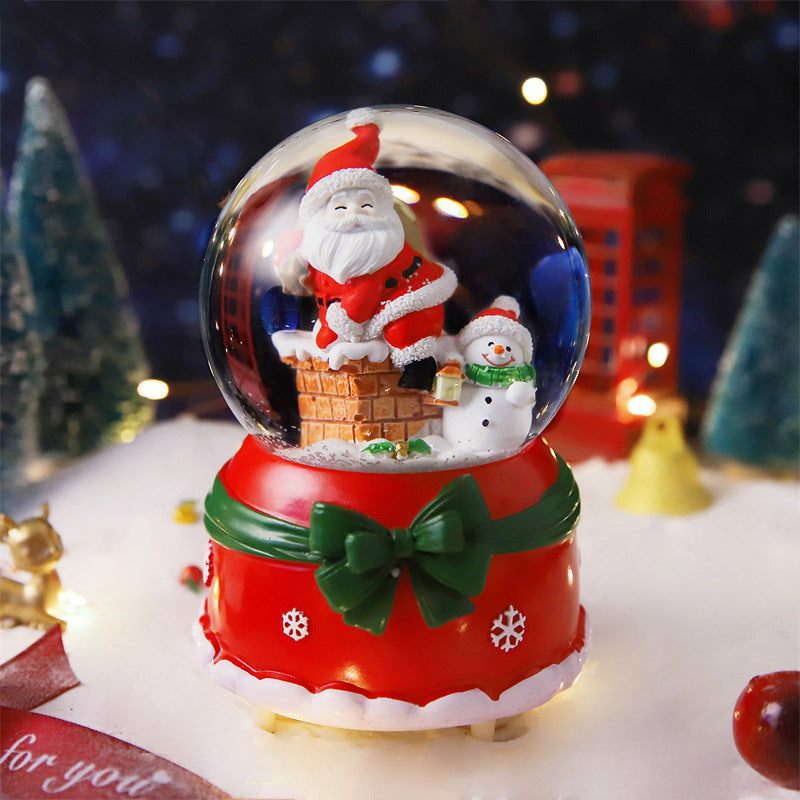 Bola de nieve navideña con luz y música