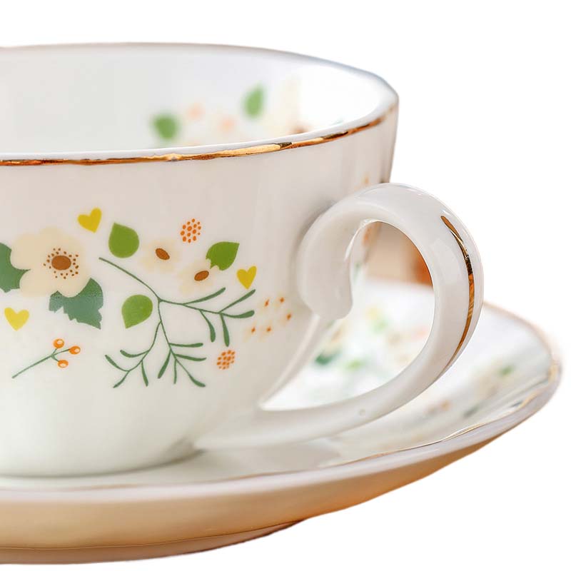 Juego de tetera con taza y platillo