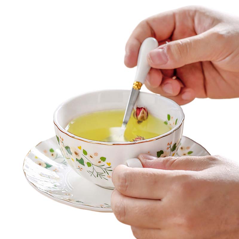 Juego de tetera con taza y platillo