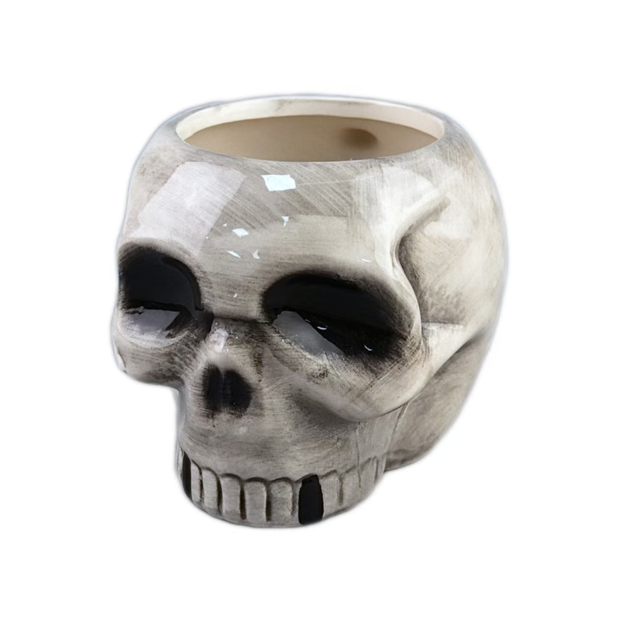 Taza de cerámica con forma de calavera