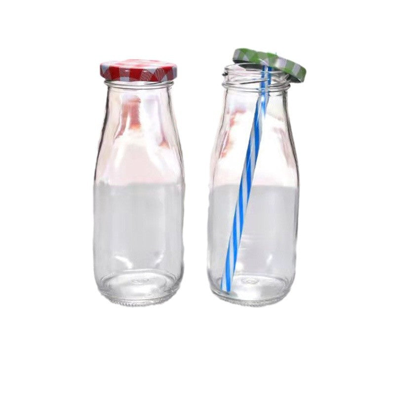 Botella de leche de vidrio transparente