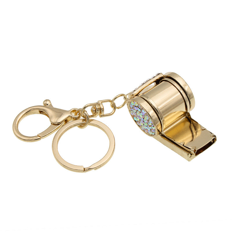 Porte-clés sifflet en strass 