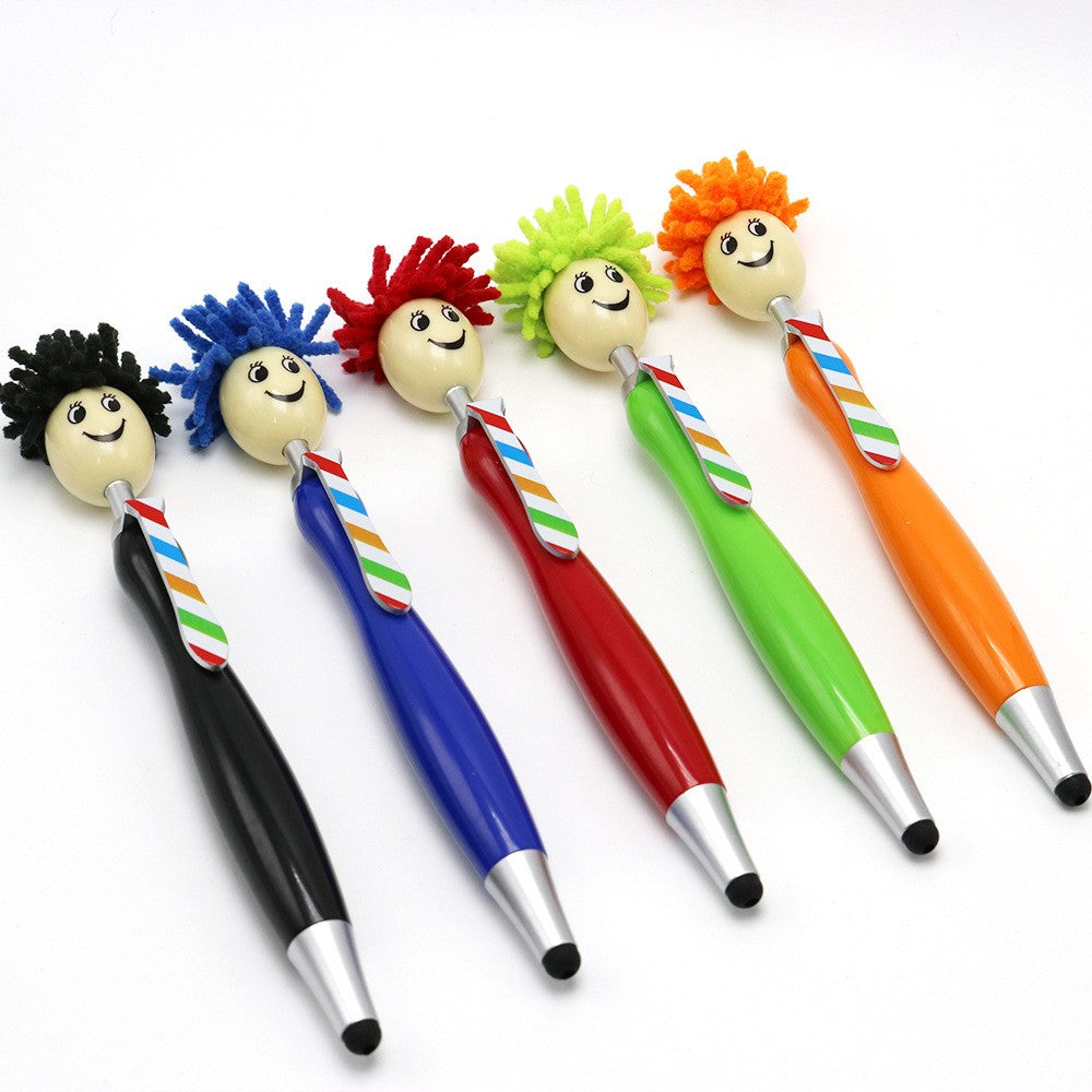 Le stylo à bille à tête de poupée 