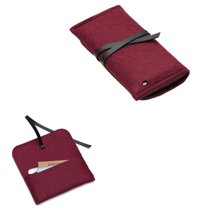 Bolso de fieltro con correa de cuero 