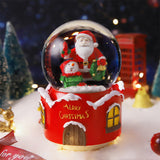 Bola de nieve navideña con luz y música 