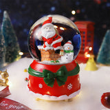 Bola de nieve navideña con luz y música 