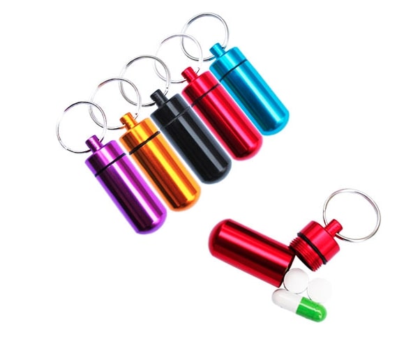 Dispensador de píldoras con anillo clave