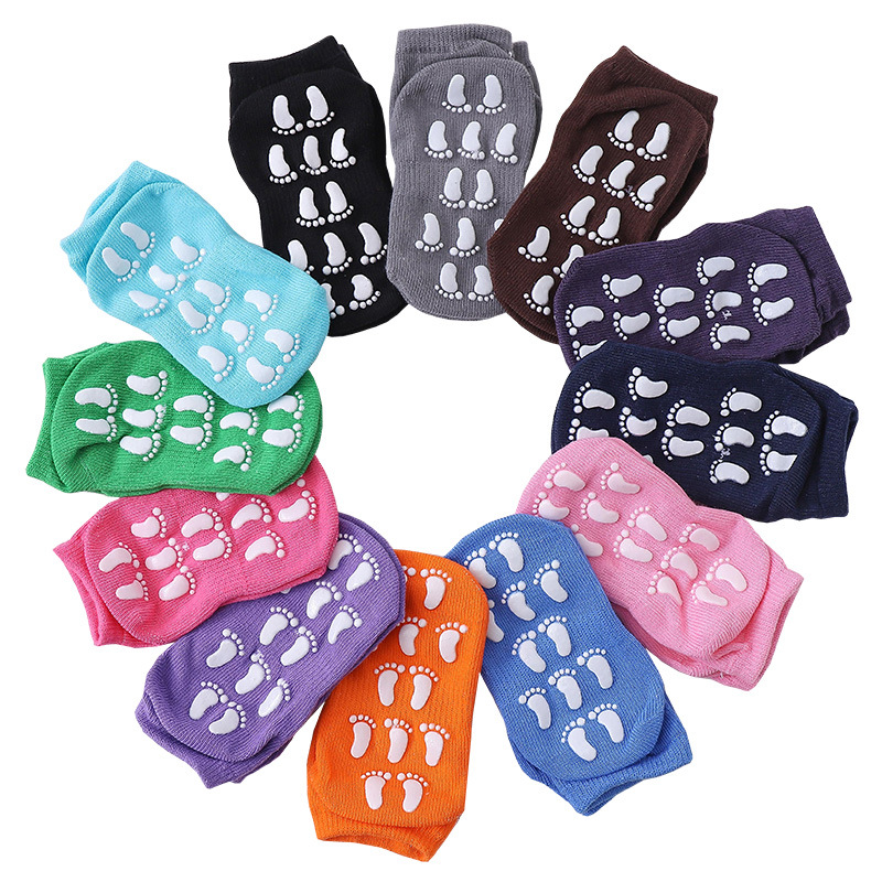 Chaussettes adhésives blanches anti-dérapantes bébé